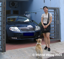 Photo taken on June 5th, 2004 at Malacca with my car, my wife, and a dog that doesn't belong to us.